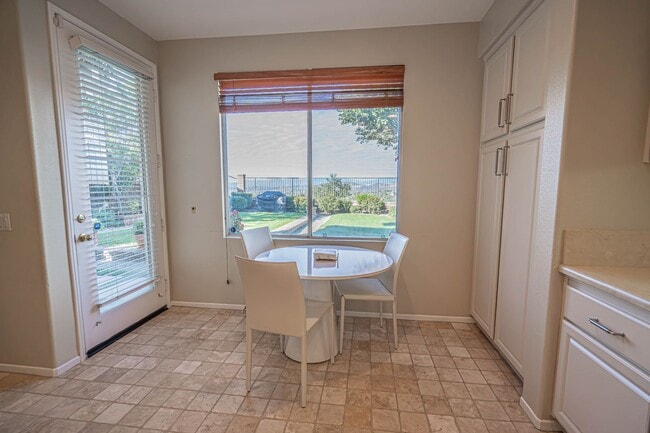 Building Photo - Stunning 4-Bedroom Home with Downstairs Bed/Bath, Views, and Remodeled Kitchen!