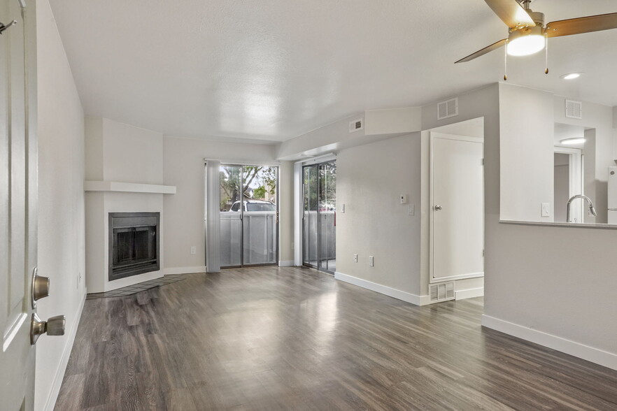 Our Apartment Living Room with Fireplace at Horizon East Apartments in Aurora, Colorado - Horizon East Apartments