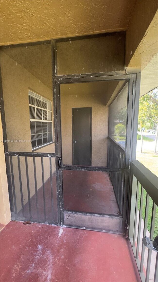 Building Photo - 10480 NW 8th St