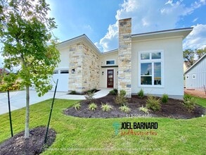 Building Photo - Available July 4! Be a Part of the Kissing Tree Community!