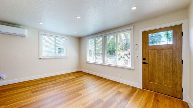 Building Photo - Bright Newly Refurbished Two Bedroom One Bath Single Family Home
