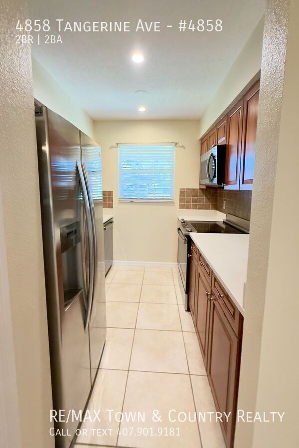 Building Photo - 4858 Tangerine Ave