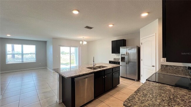 Building Photo - 2440 White Poppy Dr