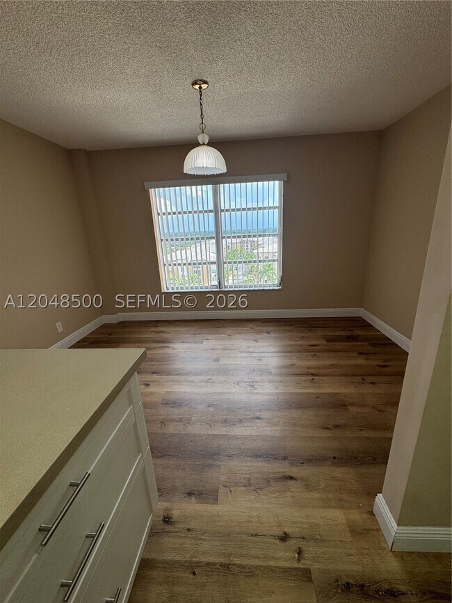 Building Photo - 10777 W Sample Rd