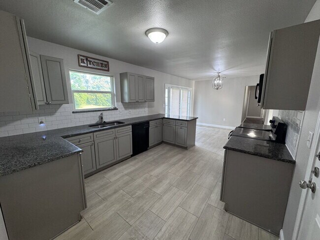 Building Photo - WONDERFULLY UPDATED 3 BEDROOM, 2 BATH, 2-CAR GARAGE RENTAL HOME IN CENTRAL GRAND PRAIRIE WITH SPA...