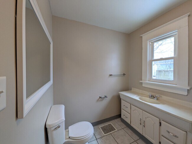 Building Photo - Large 4 Bedroom Home with Garage, Deck, & Fence!