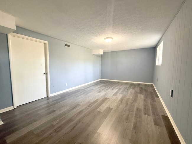 Building Photo - Updated 3-Bedroom with Bonus Room, Deck & Screened-In Porch