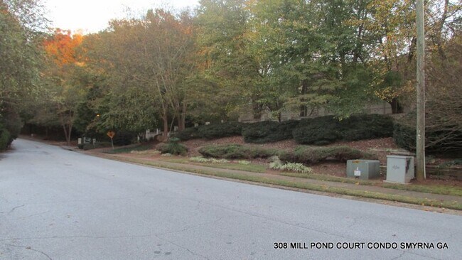 Building Photo - ENJOY THIS BEAUTIFUL CONDO NESTLED IN THE ...