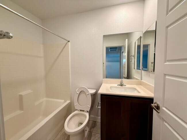 Building Photo - 3 BED 2.5 BATH 2 CAR GARAGE TOWNHOUSE w/ P...