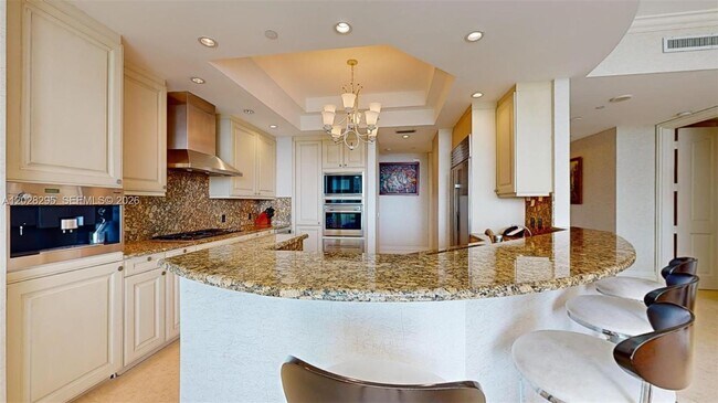 Building Photo - 10295 Collins Ave