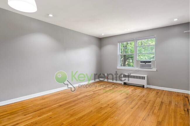 Building Photo - Quiet 2nd-Floor 1BR Condo – Updated Bath, Pet Friendly & Easy NYC Commute