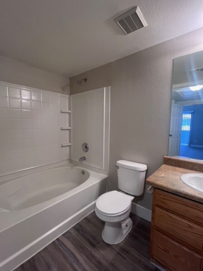 Building Photo - Three bedroom townhouse with 2 car garage
