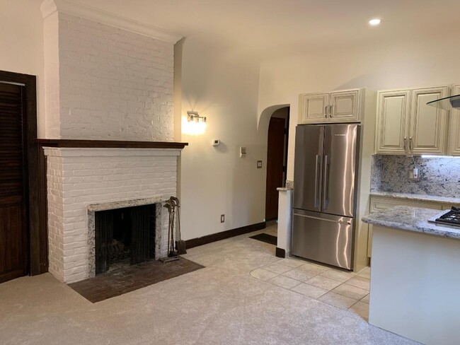 Kitchen, open living room to front door alcove - 2357 Prospect St