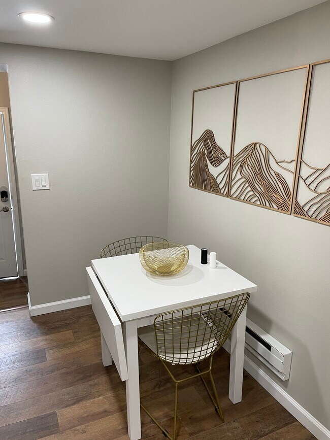Dining area with front door to the left - 8255 Oak St