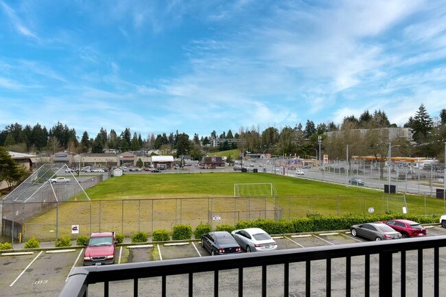 Building Photo - Spacious Two-Bedroom, Two-Bath Living at Marigold Apartments — Available Now