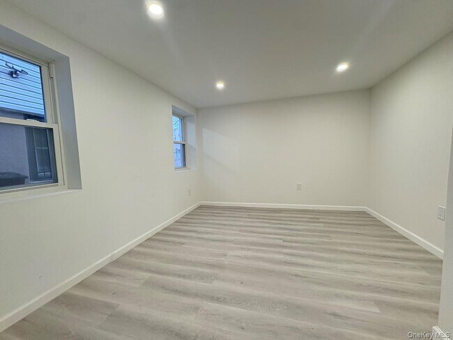 Building Photo - 69-16 Almeda Ave