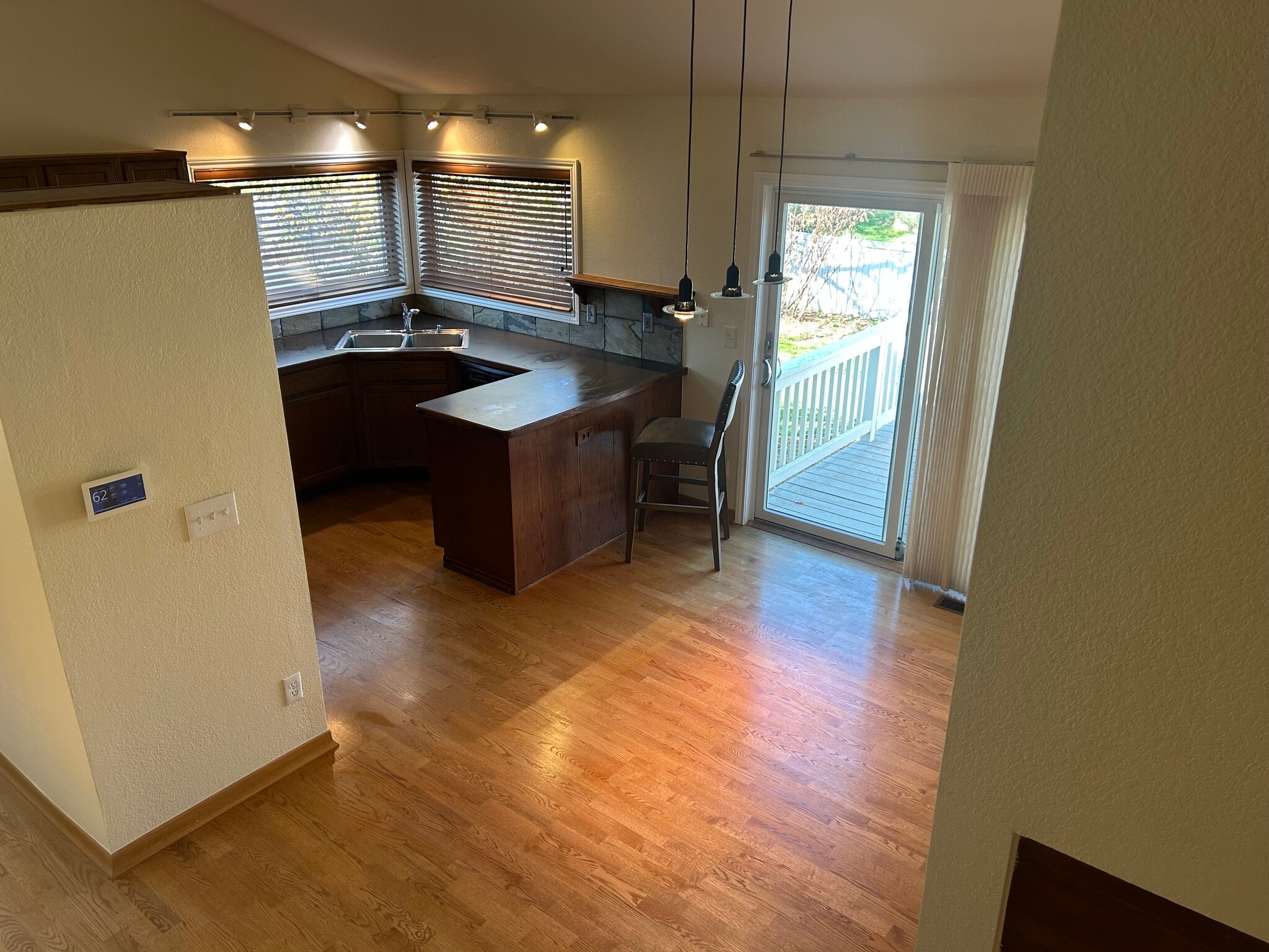 kitchen with deck access - 5717 Table Top Ct