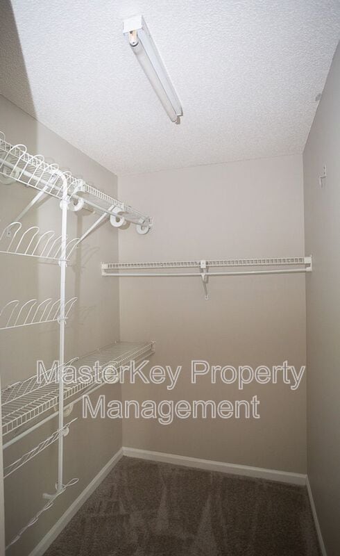 Building Photo - 7916 Strawberry Meadows St