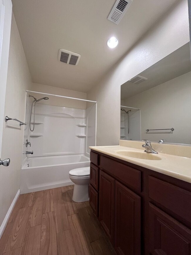 Building Photo - SINGLE STORY 3 BR/ 2 HOME WITH 2 CAR GARAGE