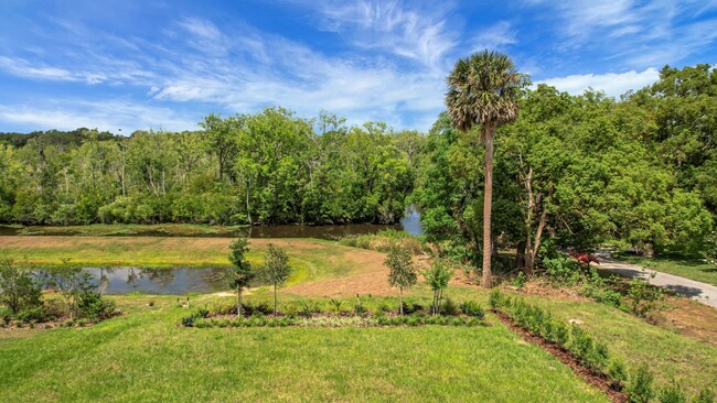 Building Photo - Stunning 4/3 in Gated Dora Parc! Water Views!