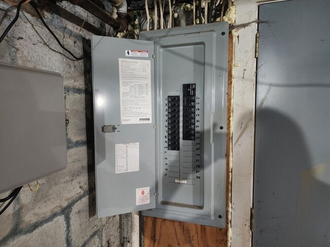 Building Photo - 4 BR home with first-floor living, new roof, and a private-feeling backyard in Lincoln Place