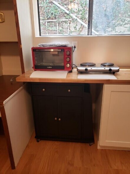 oven and roll out cart under counter - 1432 W 16th St