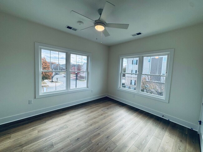 Building Photo - Brand New Luxury Condo - Top Floor