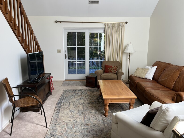 Living room with french doors into backyard - 250 Thimbleberry Rd