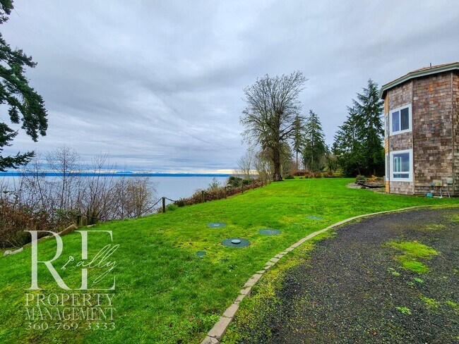 Building Photo - MOVE-IN SPECIAL: 50% OFF FIRST MONTHS RENT - Waterfront Rustic Retreat with Vaulted Ceilings, Pic...
