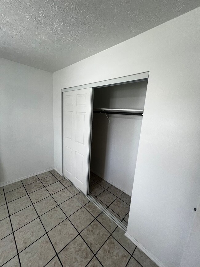 Building Photo - 3 BEDROOM 2 BATH CONVENIENTLY LOCATED WITH A TROPICAL OASIS IN THE BACK YARD!