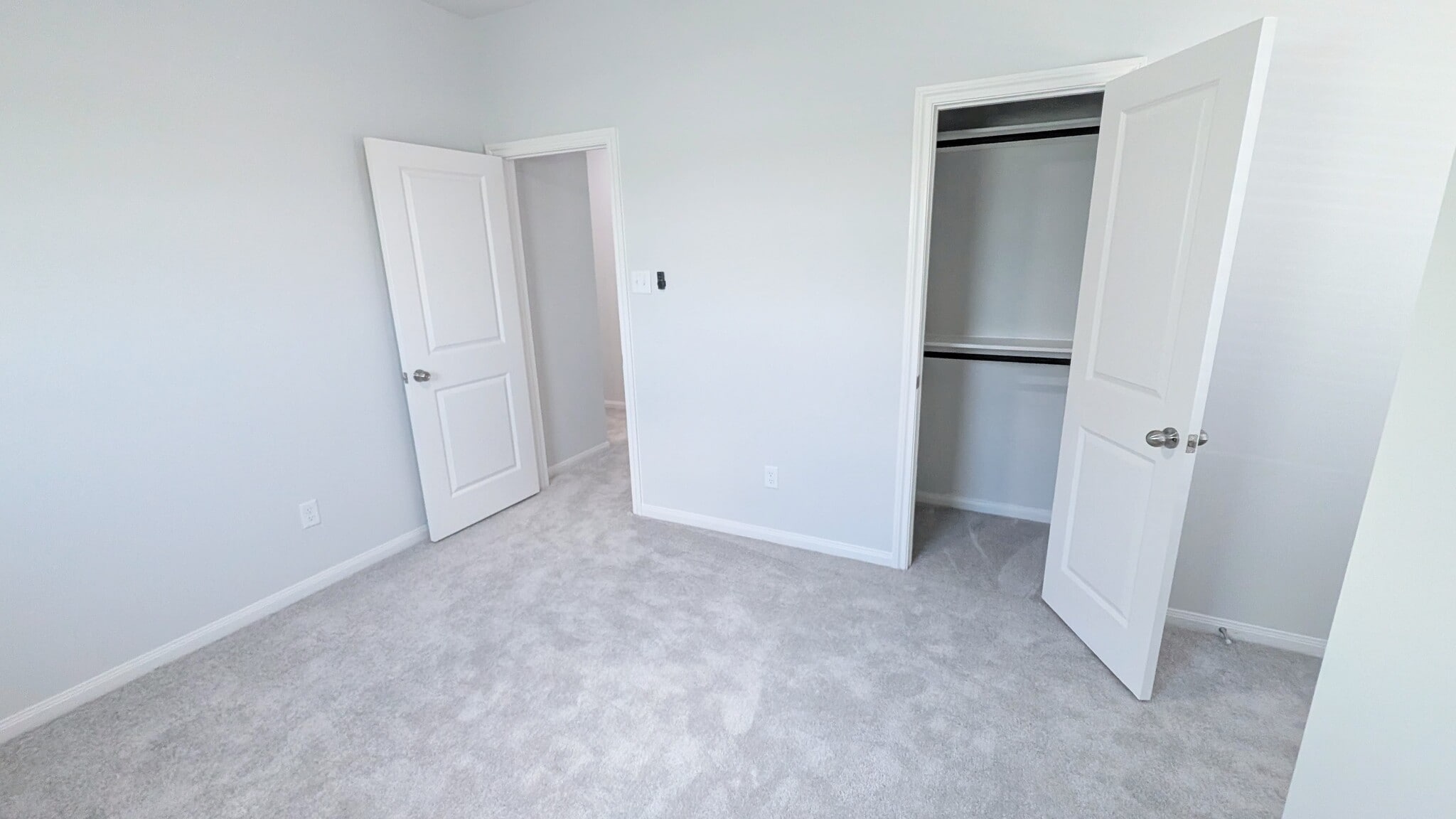 Bedroom 2 is spacious enough for a king size bed or two twin beds. - 13218 HP Johnson St