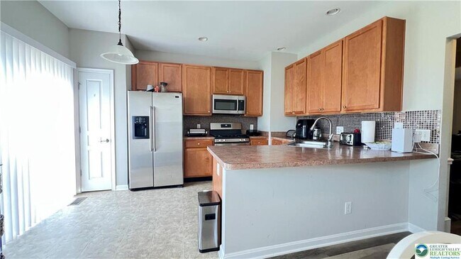 Building Photo - 8495 Putnam Ct