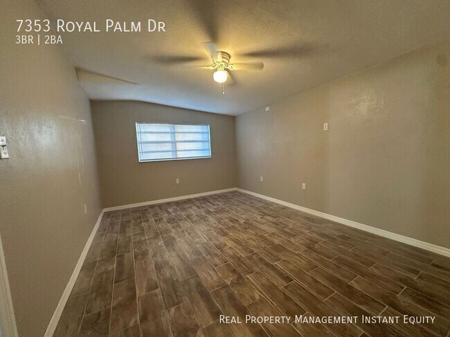 Building Photo - 7353 Royal Palm Dr