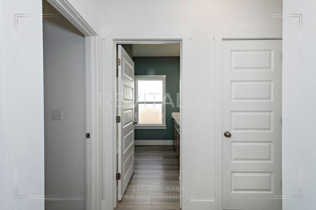 Building Photo - HALF-DEPOSIT SPECIAL! Charming Gold Fortified Home in Live Oak Estates – Near Downtown Fairhope!