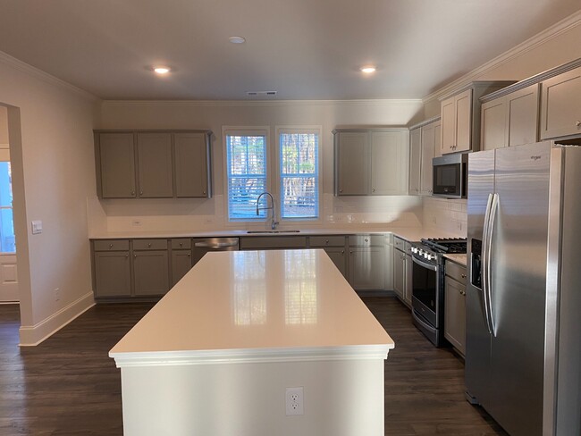 Building Photo - Modern 3-Story Townhome Near Woodstock High & Middle School