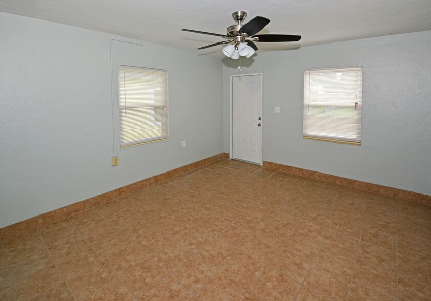 Bedroom 2 with door to outside - 5009 TANGERINE AVE S