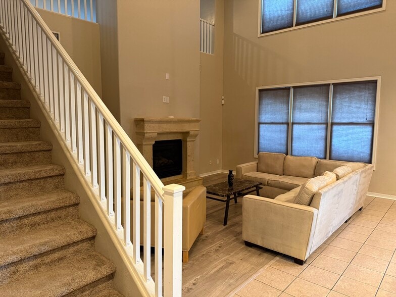 Grand staircase and family room - 6709 S 40th Ave