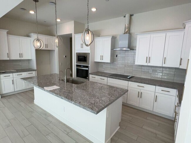 Building Photo - Executive Single-Story 4-Bedroom Rental with $50K+ Upgrades & Indoor-Outdoor Living in Chandler, AZ