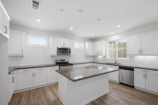 Building Photo - NEW LISTING 4 Bedroom, 3 Bathroom, 2 Garage Detached Condominium, with HVAC, Tankless Water Heate...