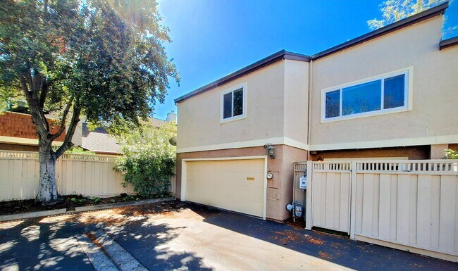 Building Photo - Spacious Two-Story 3bd Townhouse With Private Patios, Balcony, & Garage