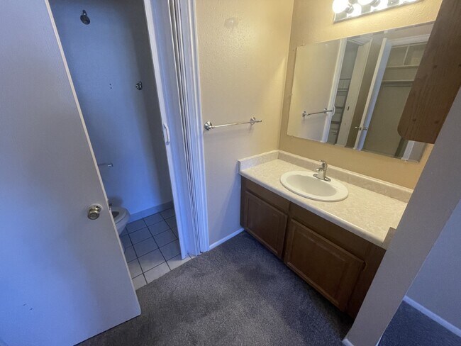 Building Photo - Spacious 6-Bed Oasis with Finished Basement & Cozy Fireplace.