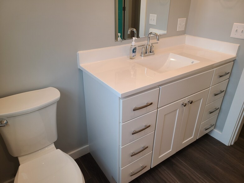 The bathroom vanity has lots of storage space. - 24 Wilsons End Pl