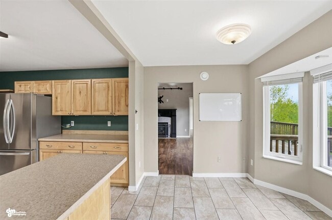 Building Photo - Luxury Alaska Living with Room to Spread Out — Mountain Views, Massive Garage & Incredible Commut...