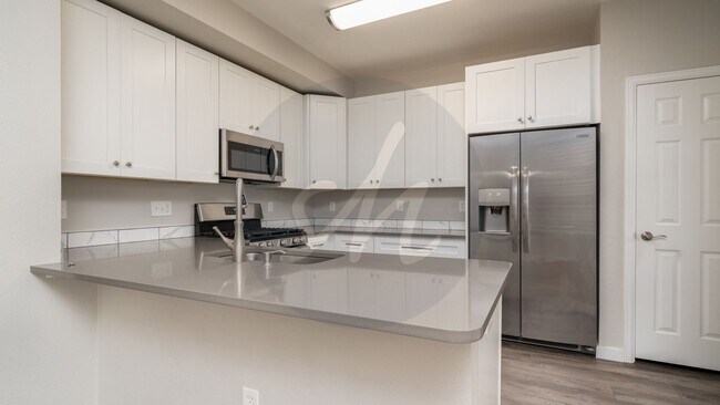 Building Photo - 2 Bedroom Wolf Ranch Townhome with 2 Car Garage