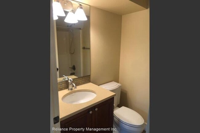 Building Photo - Stunning Tri-Level Condo with Open Concept Layout, Loft, and Private Patio!