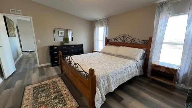 Building Photo - Beautiful Solar-Powered 3 Bedroom Home