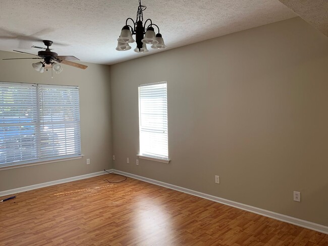 Building Photo - Indigo Run Townhomes with Wood Laminate Fl...