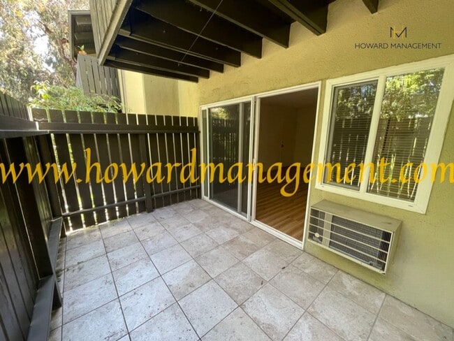 Building Photo - Bonus Den! Beautiful lower condo with large patio in Tara Hills, a resort style living complex!