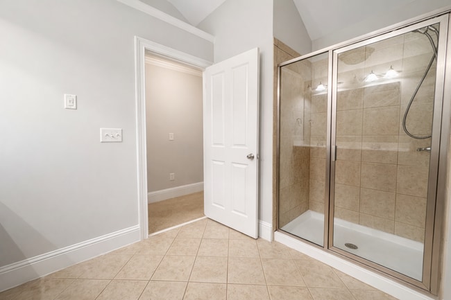 Building Photo - Gated Johns Creek Townhome Offering Space, Privacy, and Everyday Convenience