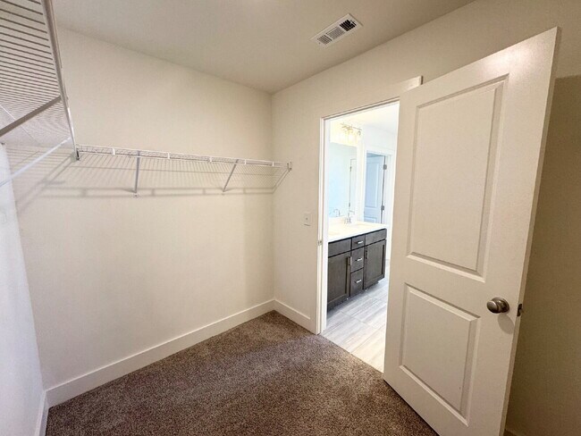 Building Photo - Stylish 3BR Townhome with Private Yard & T...